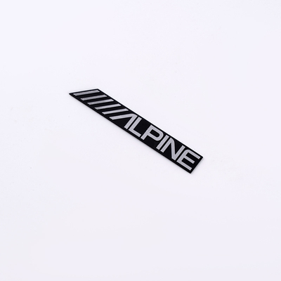 Logos métalliques en argent nickel écologique Directement OEM Forme et couleur