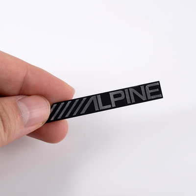 Logos métalliques en argent nickel écologique Directement OEM Forme et couleur