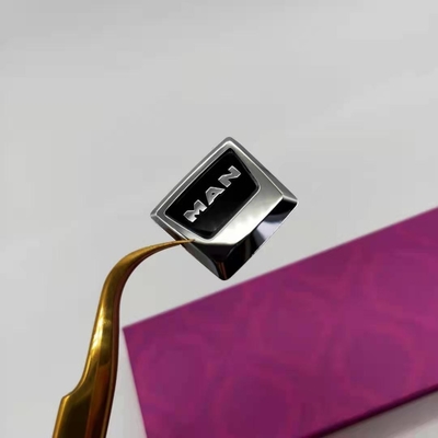 Production sur mesure d'autocollants métalliques électroformants au nickel pour clés de voiture