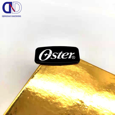 Étiquettes de logo métalliques en nickel et cuivre électroformées pour des solutions de marque personnalisées